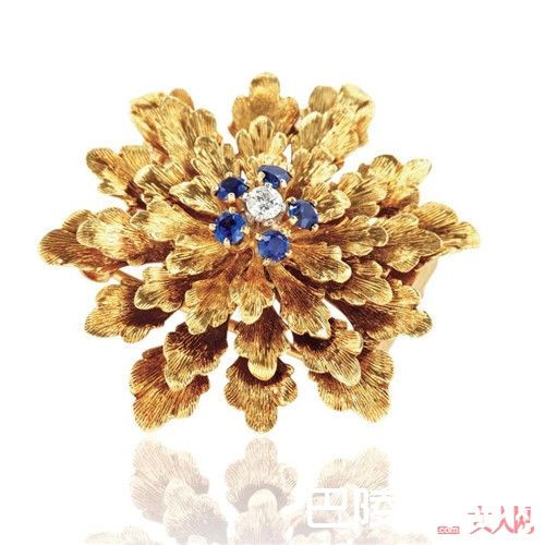 卡地亚黄金镶钻“幽兰百合”金叶胸针简介_最适合春天的珠宝有哪些？春天到来选一款适合自己的珠宝吧