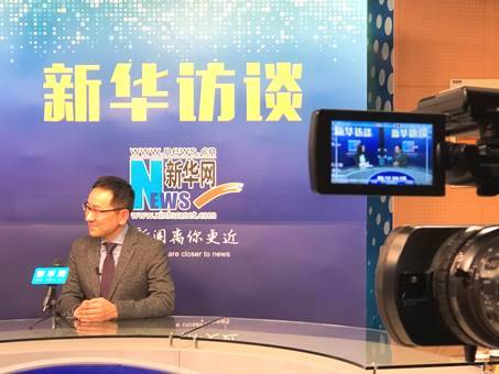 新华访谈新闻稿图三.jpg
