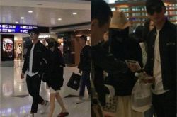 恩爱夫妻黄晓明夫妇现机场 baby穿平底鞋显孕味 