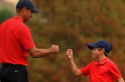 老虎伍兹儿子高尔夫首秀抢风采 有望子承父业