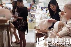 可能是女孩 陈妍希挺孕肚买粉色婴儿服饰