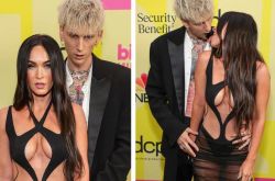 梅根福克斯告示牌秀恩爱 巨乳激吻男友